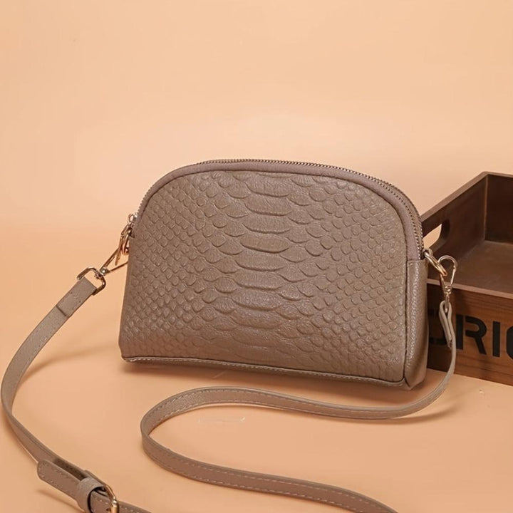 Cora | Bella mini borsa a tracolla in similpelle con motivo coccodrillo