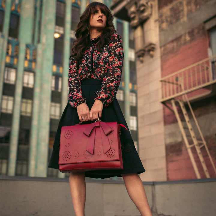 Borsa a mano elegante con fiocco
