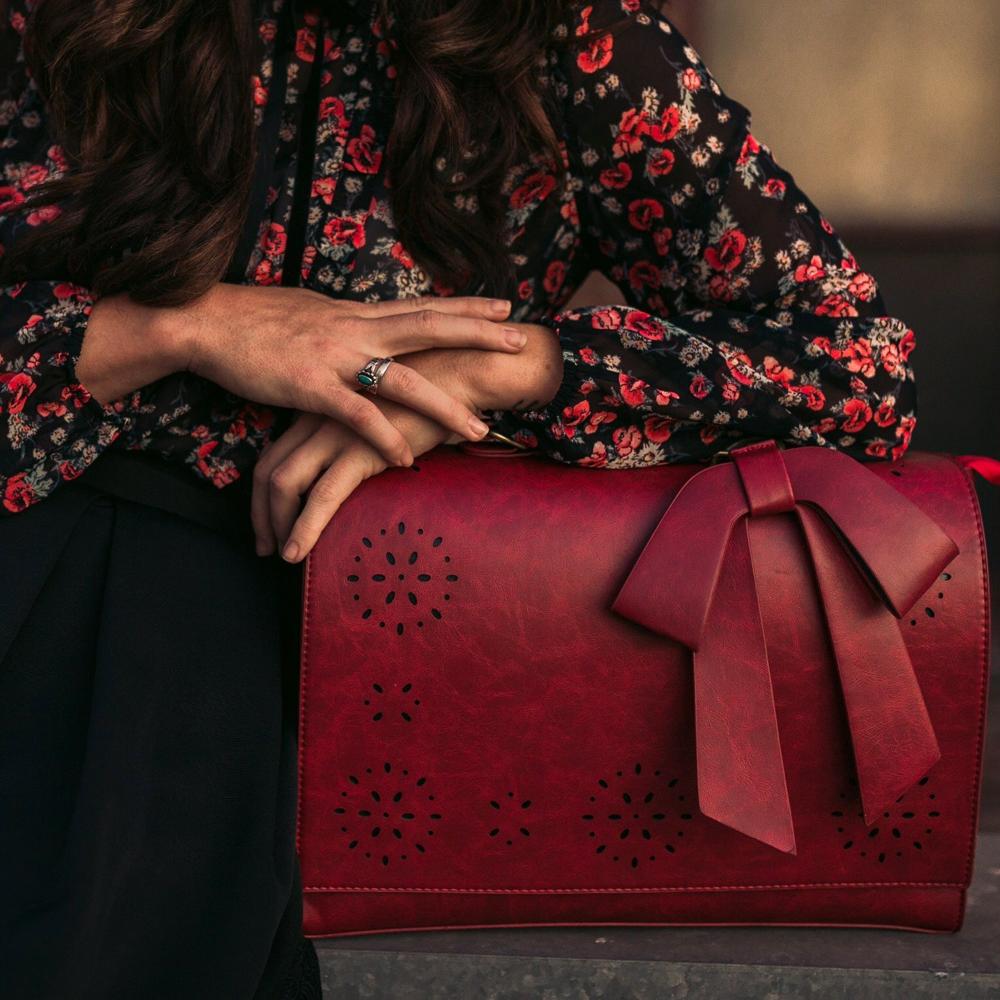 Borsa a mano elegante con fiocco