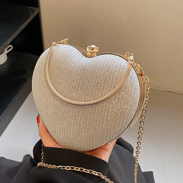 Borsa in metallo lucido a forma di cuore