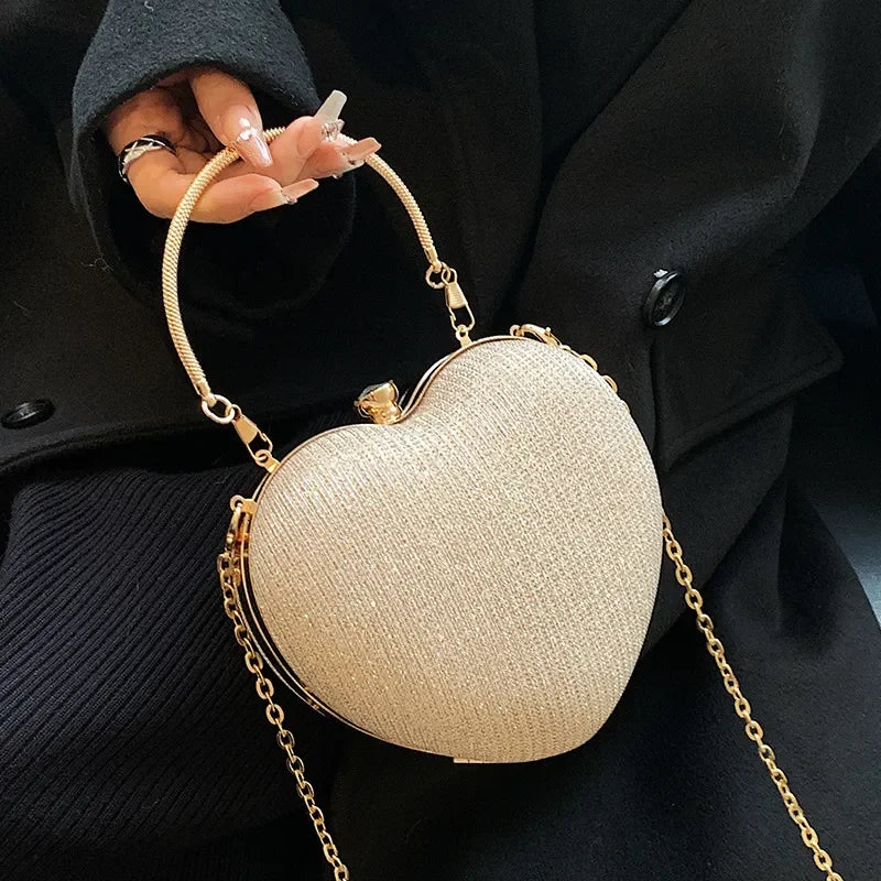 Borsa in metallo lucido a forma di cuore
