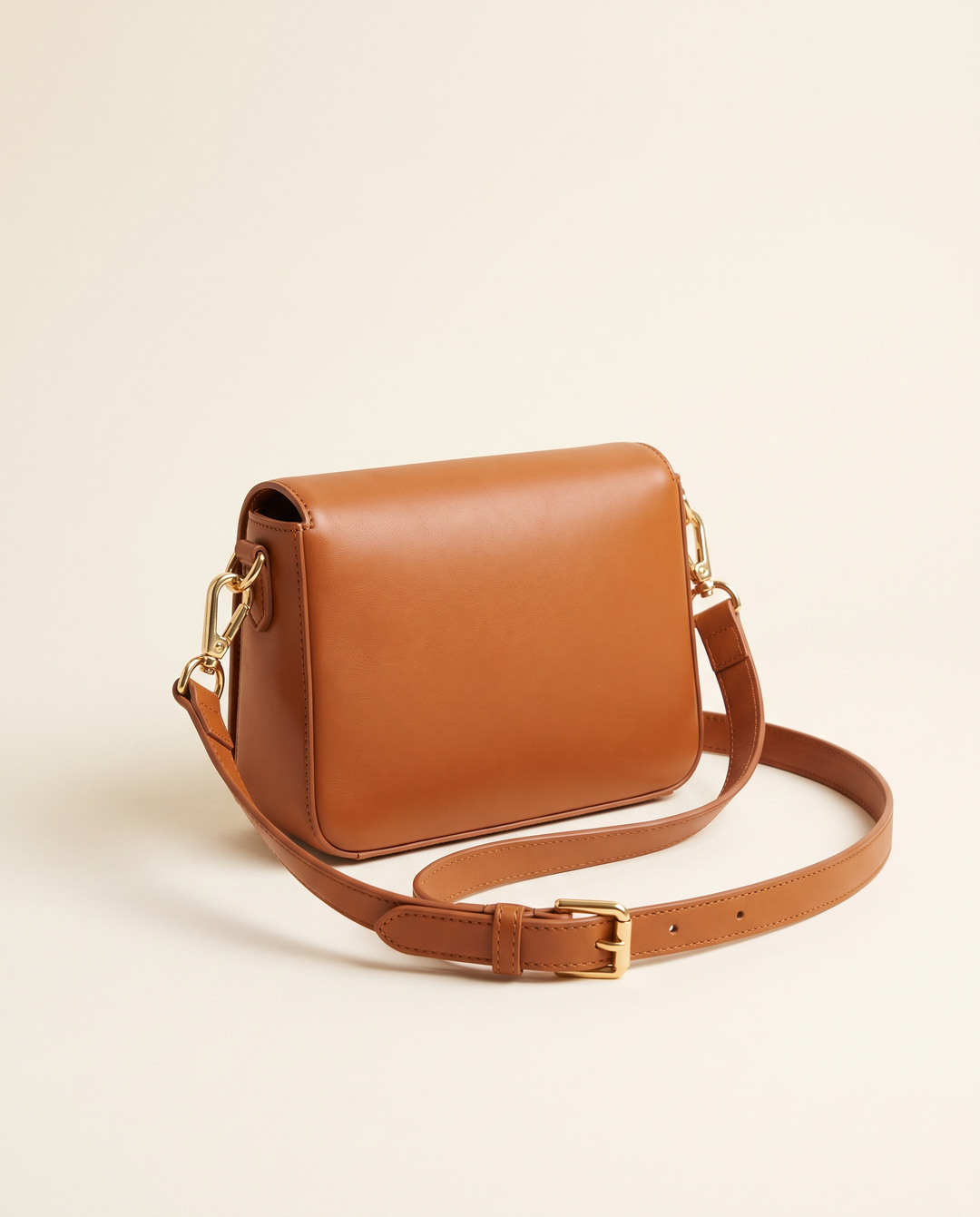 The Distillery Crossbody in cognac smooth vegan leather with polished gold-tone hardware