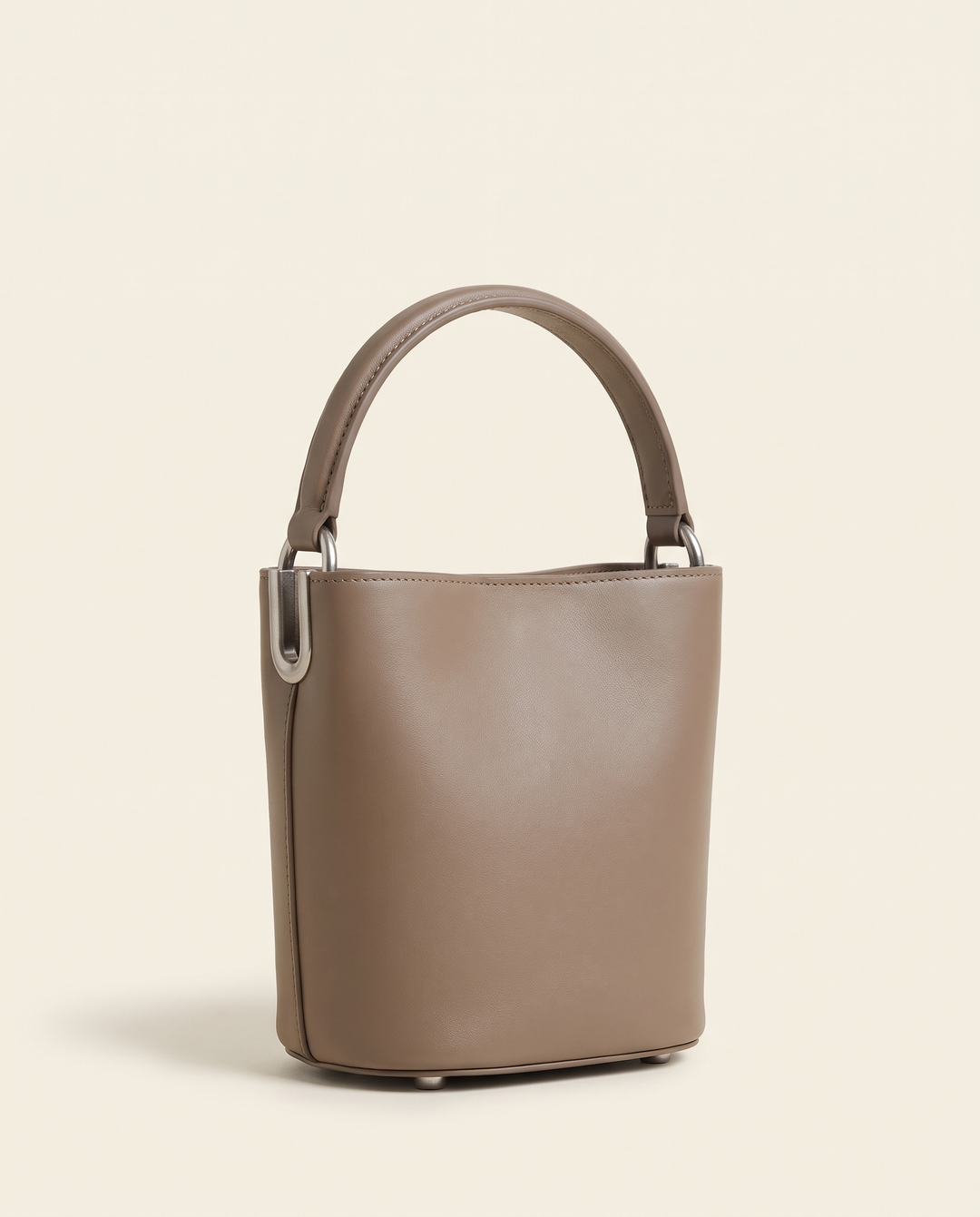 The Junction Mini in taupe smooth vegan leather with brushed silver-tone hardware