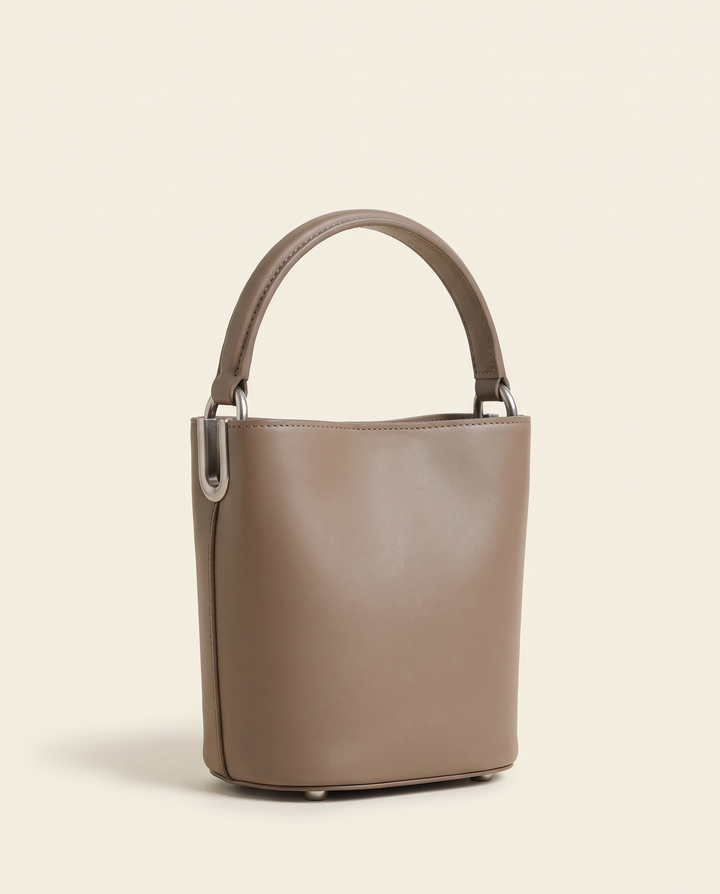 The Junction Mini in taupe smooth vegan leather with brushed silver-tone hardware